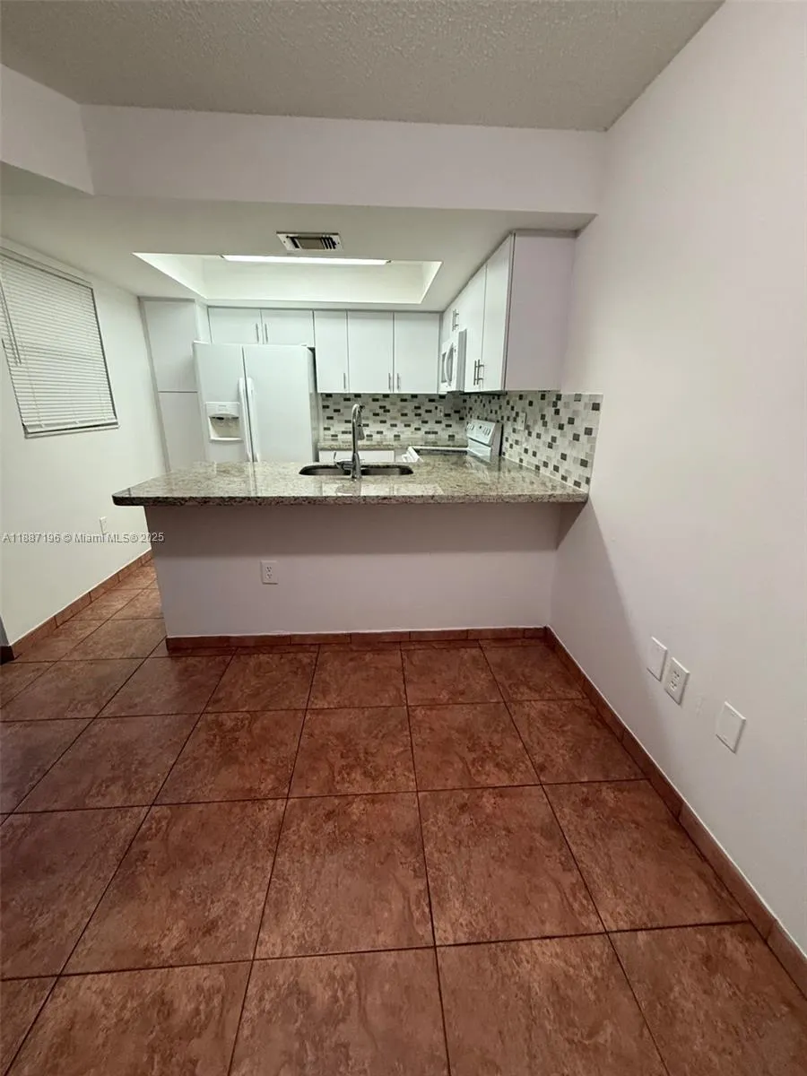 10843 NW 7th St, #14-23