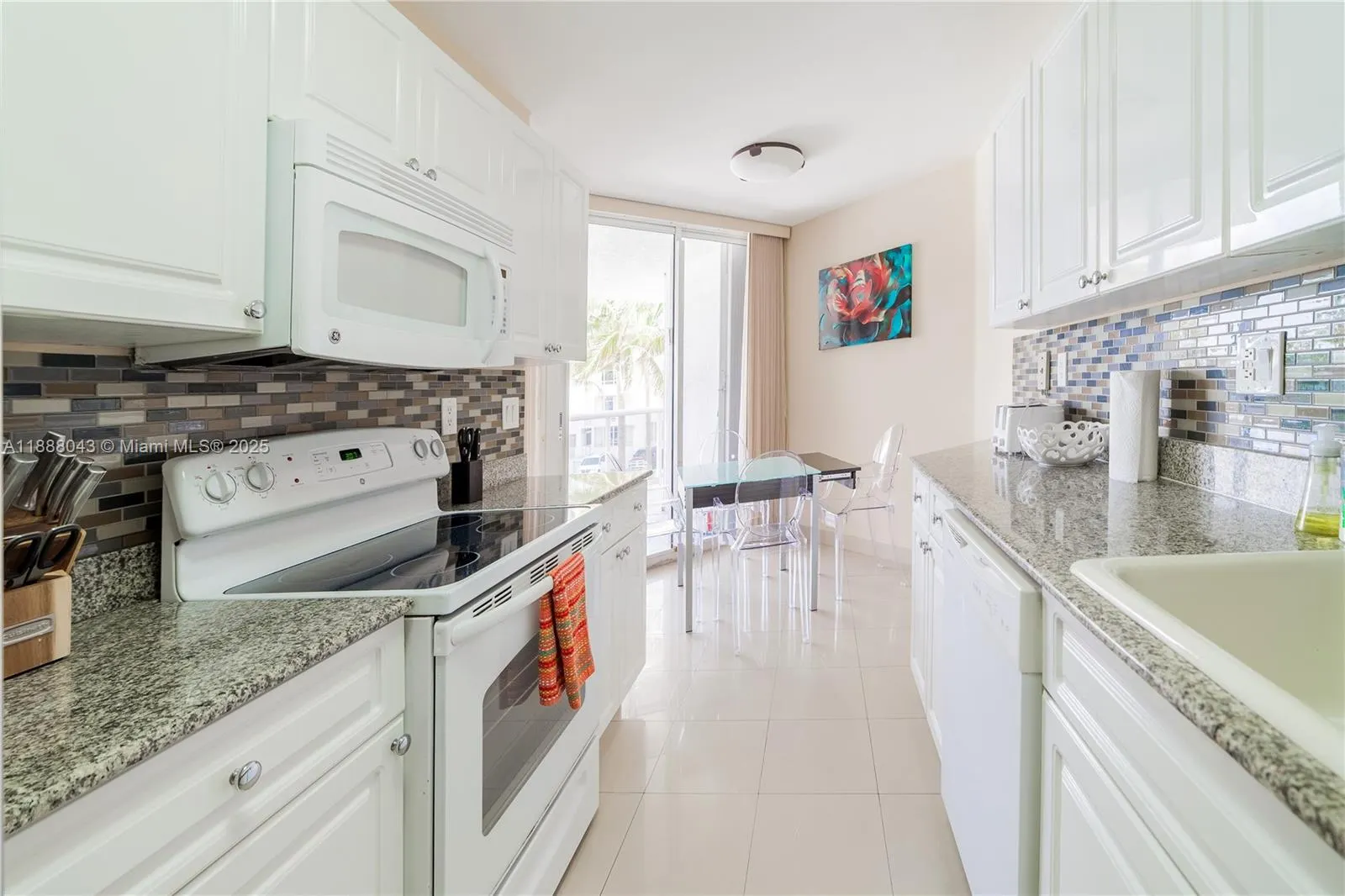 16711 Collins Ave, #303