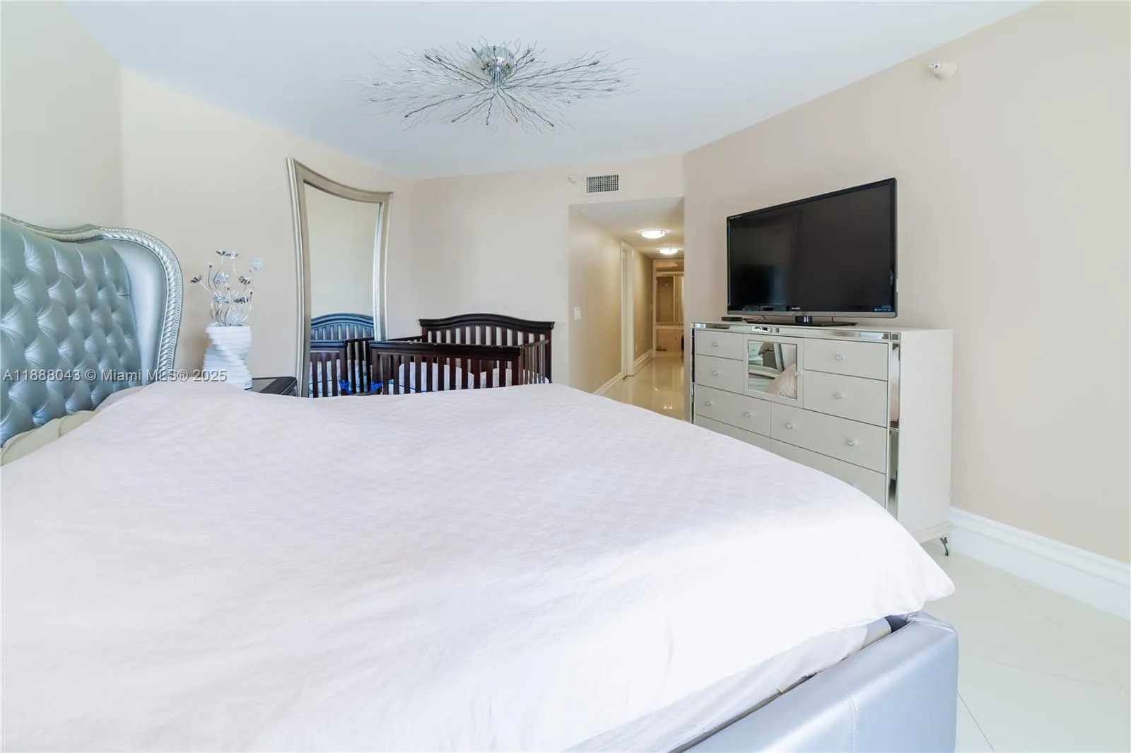 16711 Collins Ave, #303