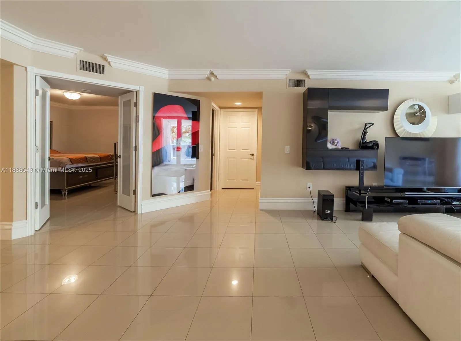 16711 Collins Ave, #303