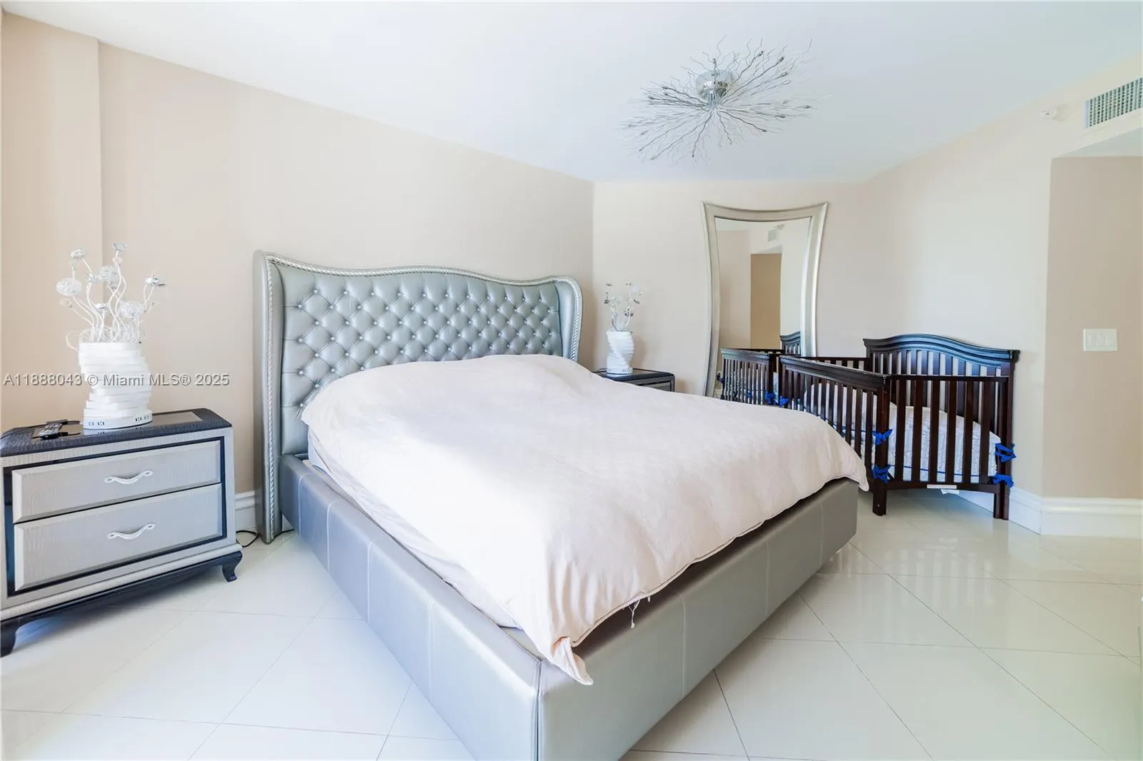 16711 Collins Ave, #303