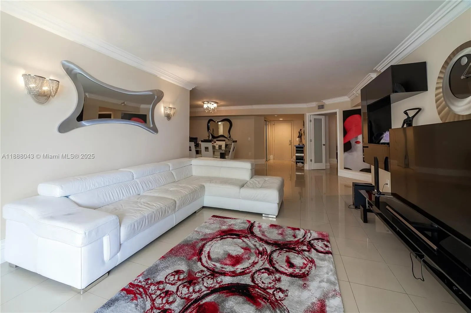 16711 Collins Ave, #303