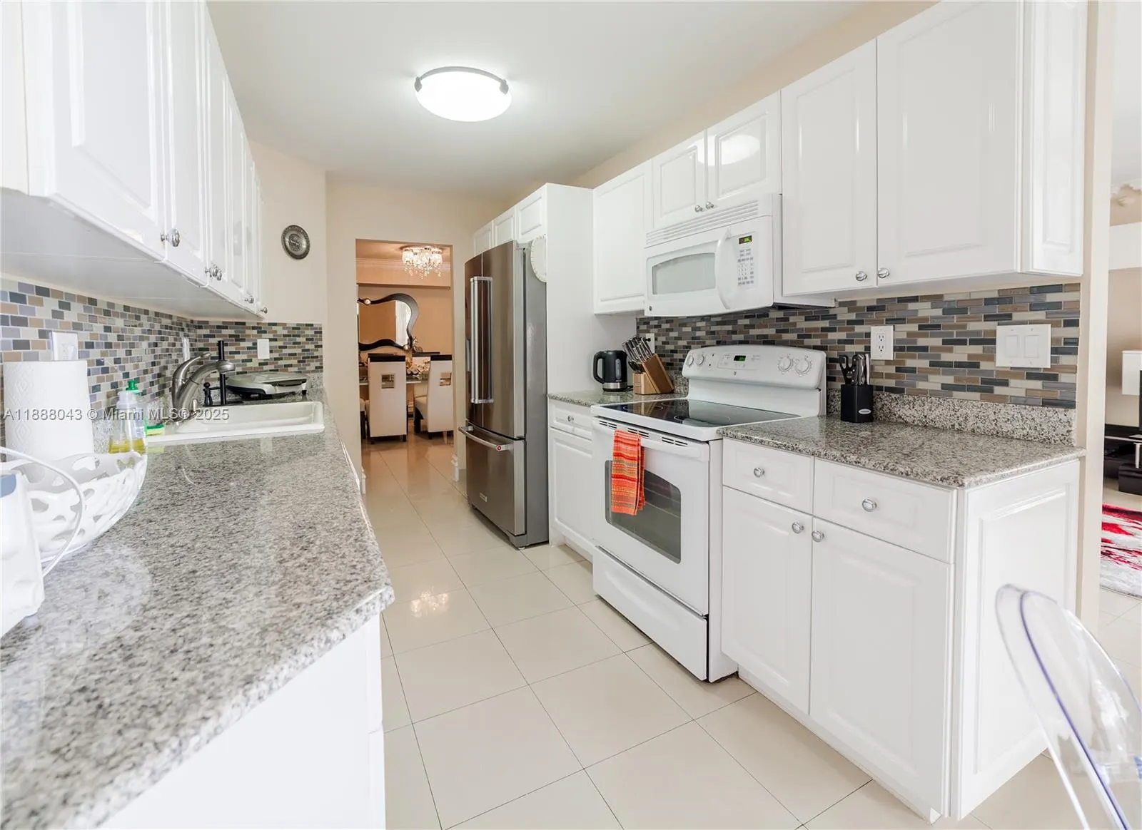 16711 Collins Ave, #303