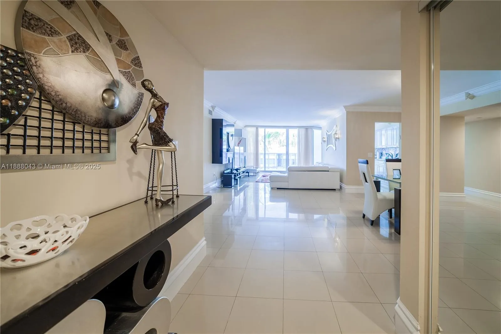 16711 Collins Ave, #303