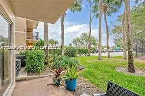 8801 Wiles Rd, #104