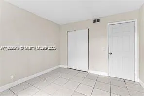 8801 Wiles Rd, #104