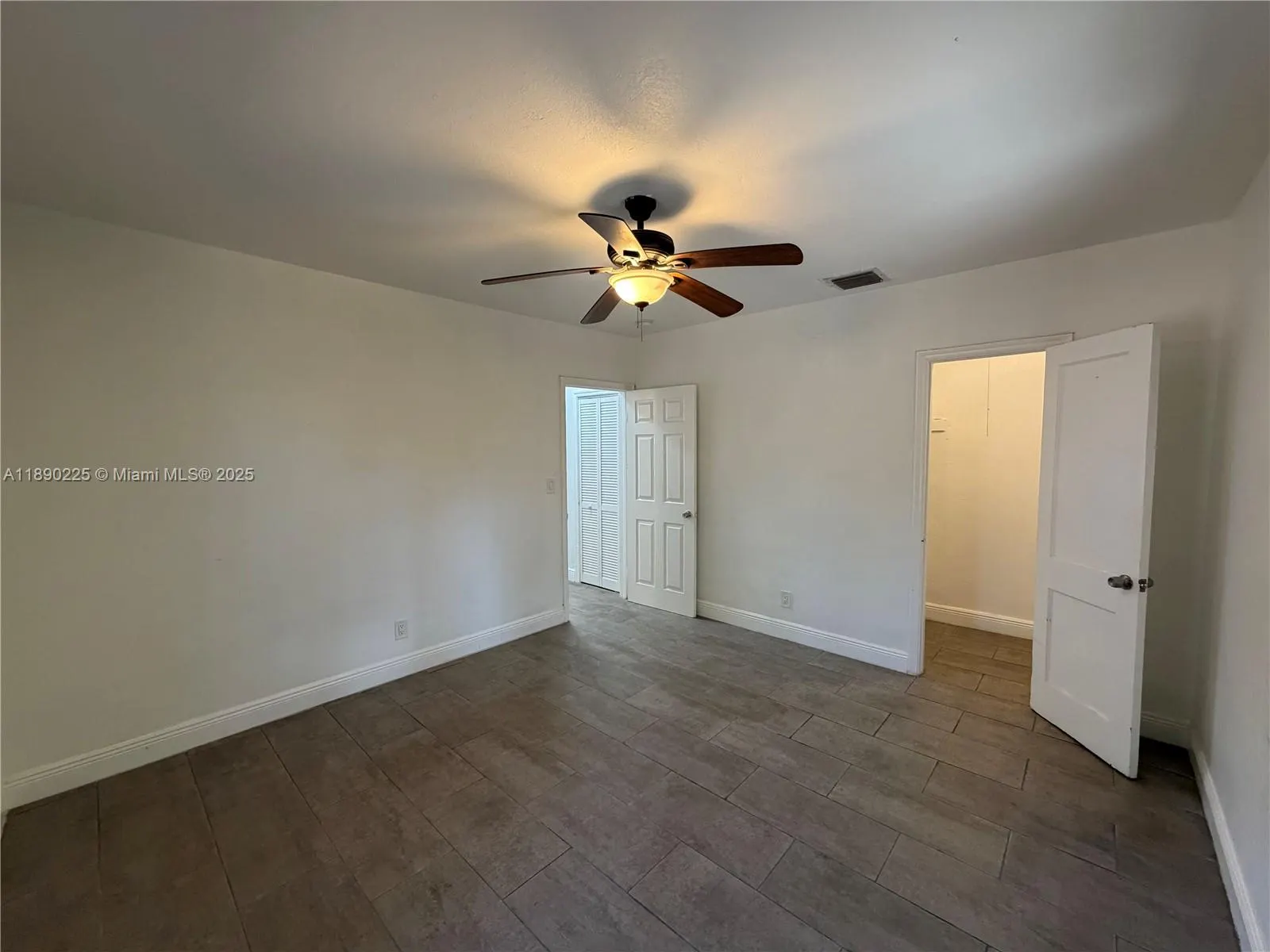 7712 NE 1st Ct, #-