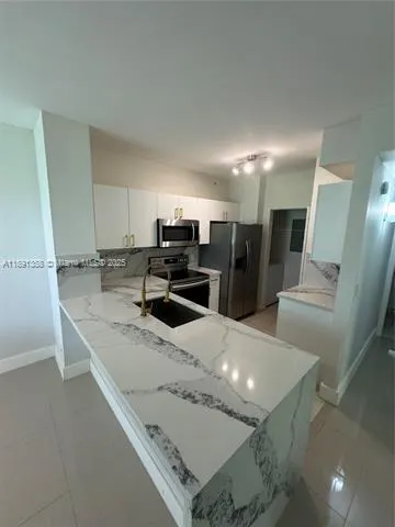 8000 N Nob Hill Rd, #101