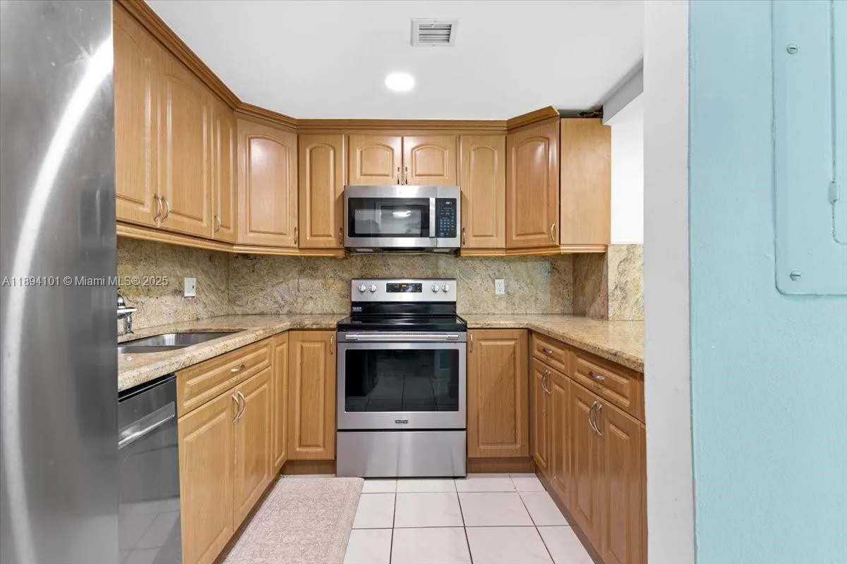 9450 Live Oak Pl, #109