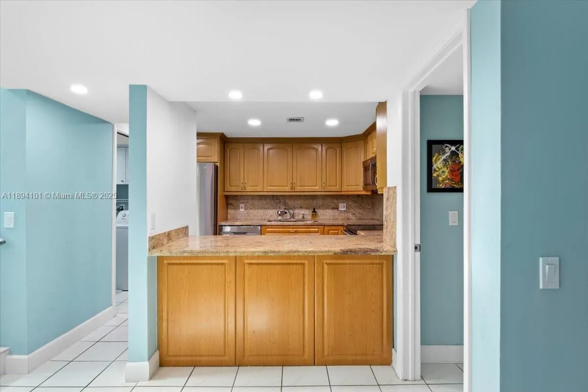 9450 Live Oak Pl, #109