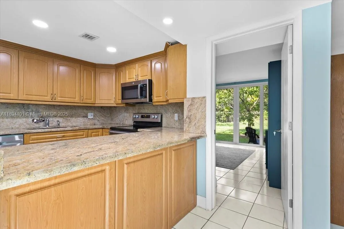 9450 Live Oak Pl, #109