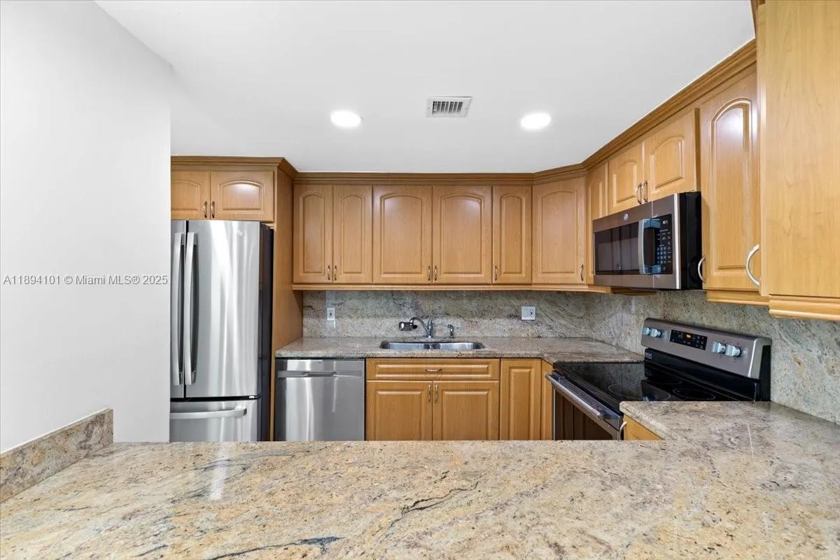 9450 Live Oak Pl, #109