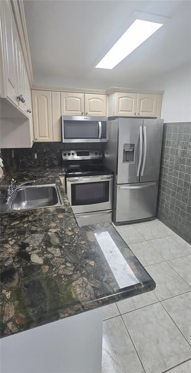 9723 Hammocks Blvd, #102