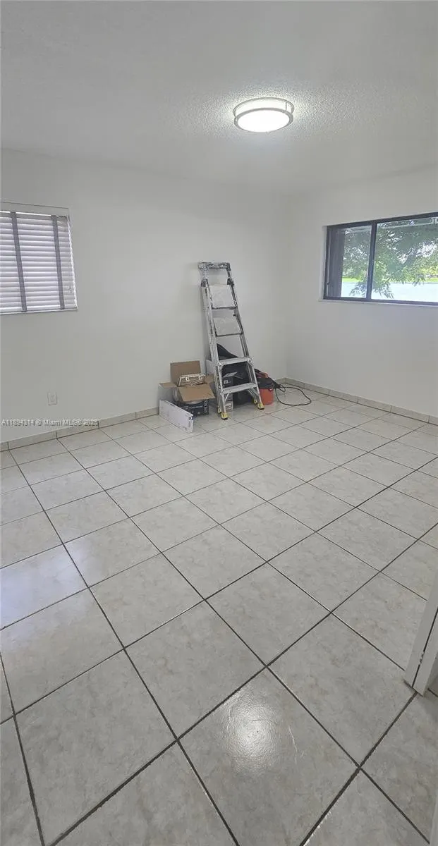 9723 Hammocks Blvd, #102