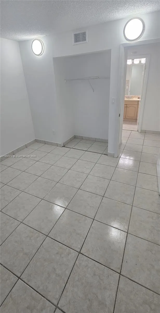 9723 Hammocks Blvd, #102