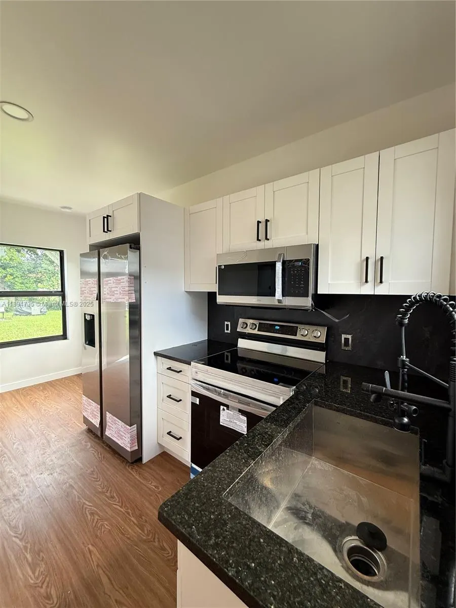 512 NW 2nd Ave, #1-4
