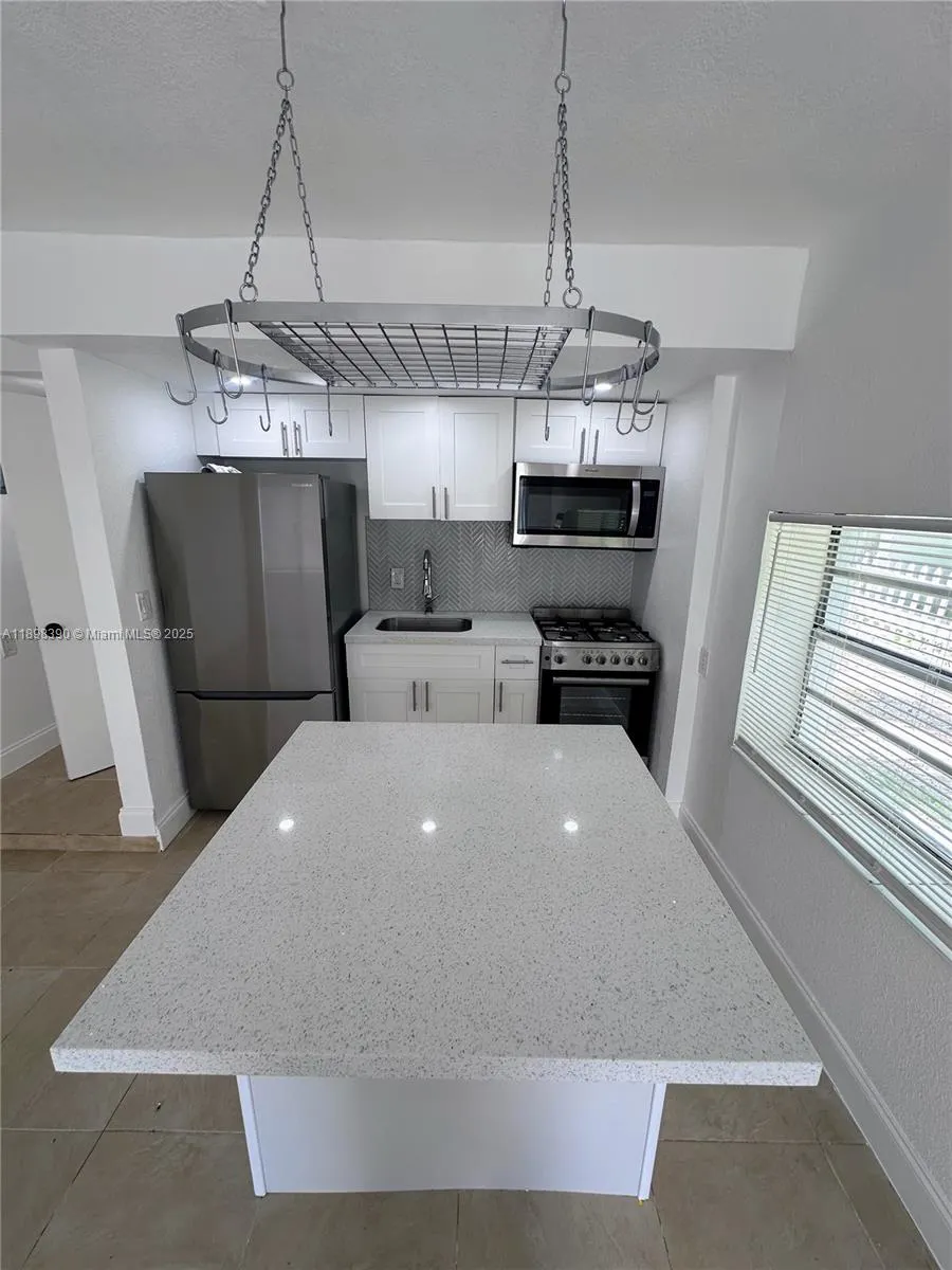 9064 Collins Ave, #C-19