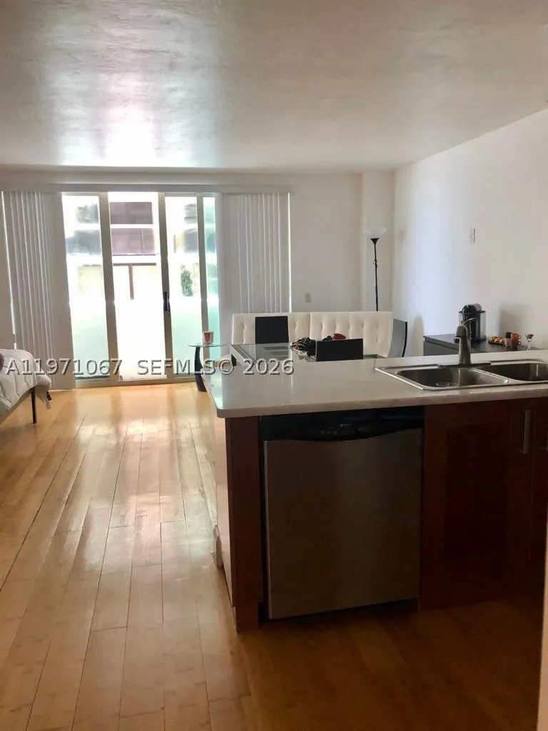 9499 Collins Ave #405