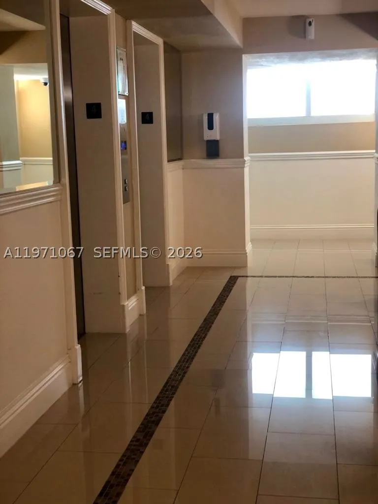 9499 Collins Ave #405