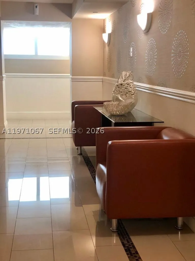 9499 Collins Ave #405