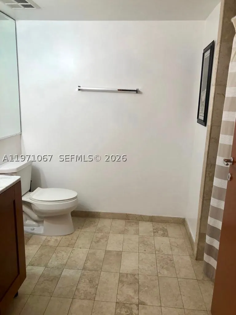 9499 Collins Ave #405