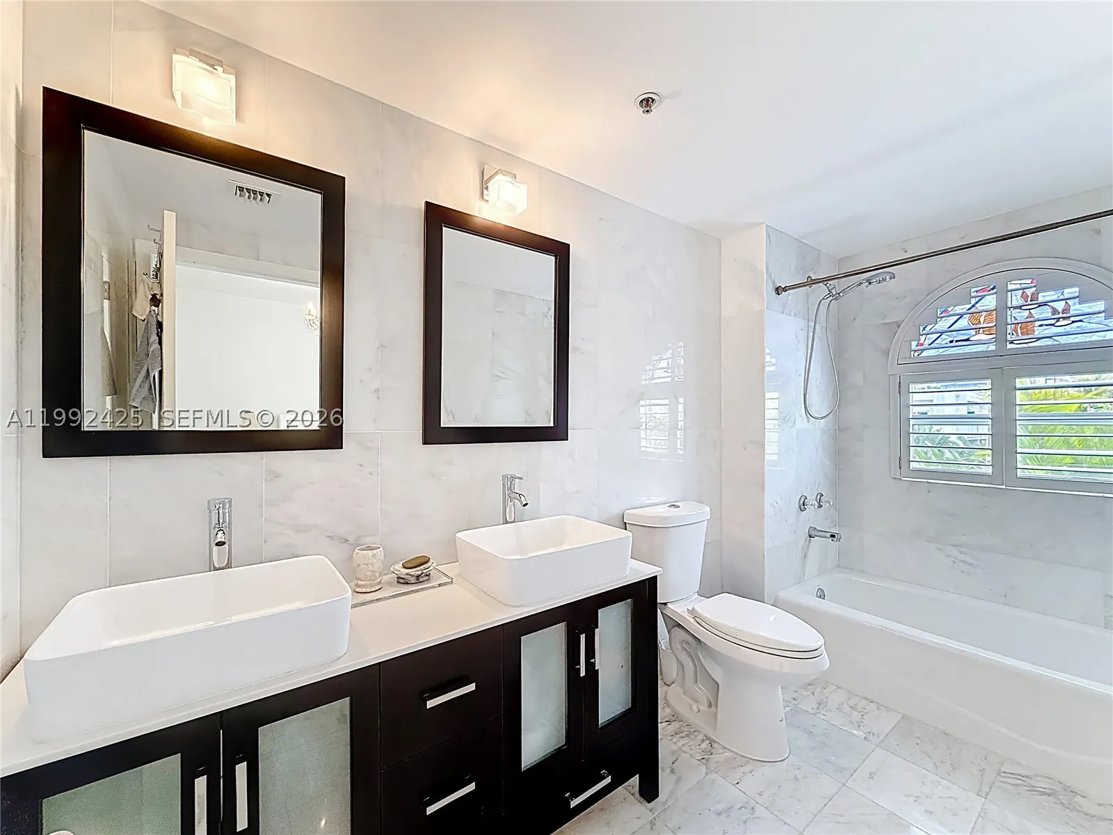 9008 Collins Ave #303