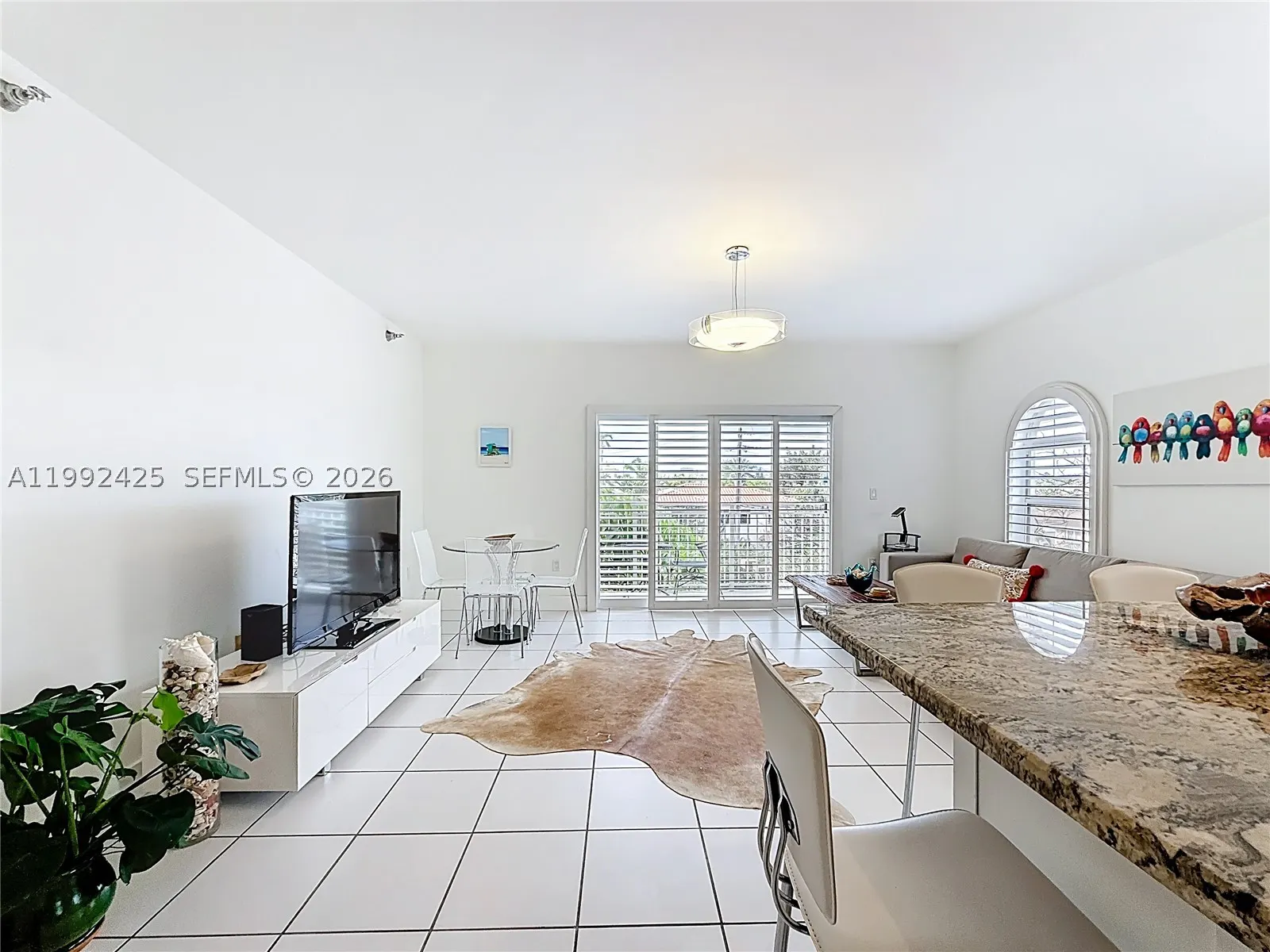 9008 Collins Ave #303