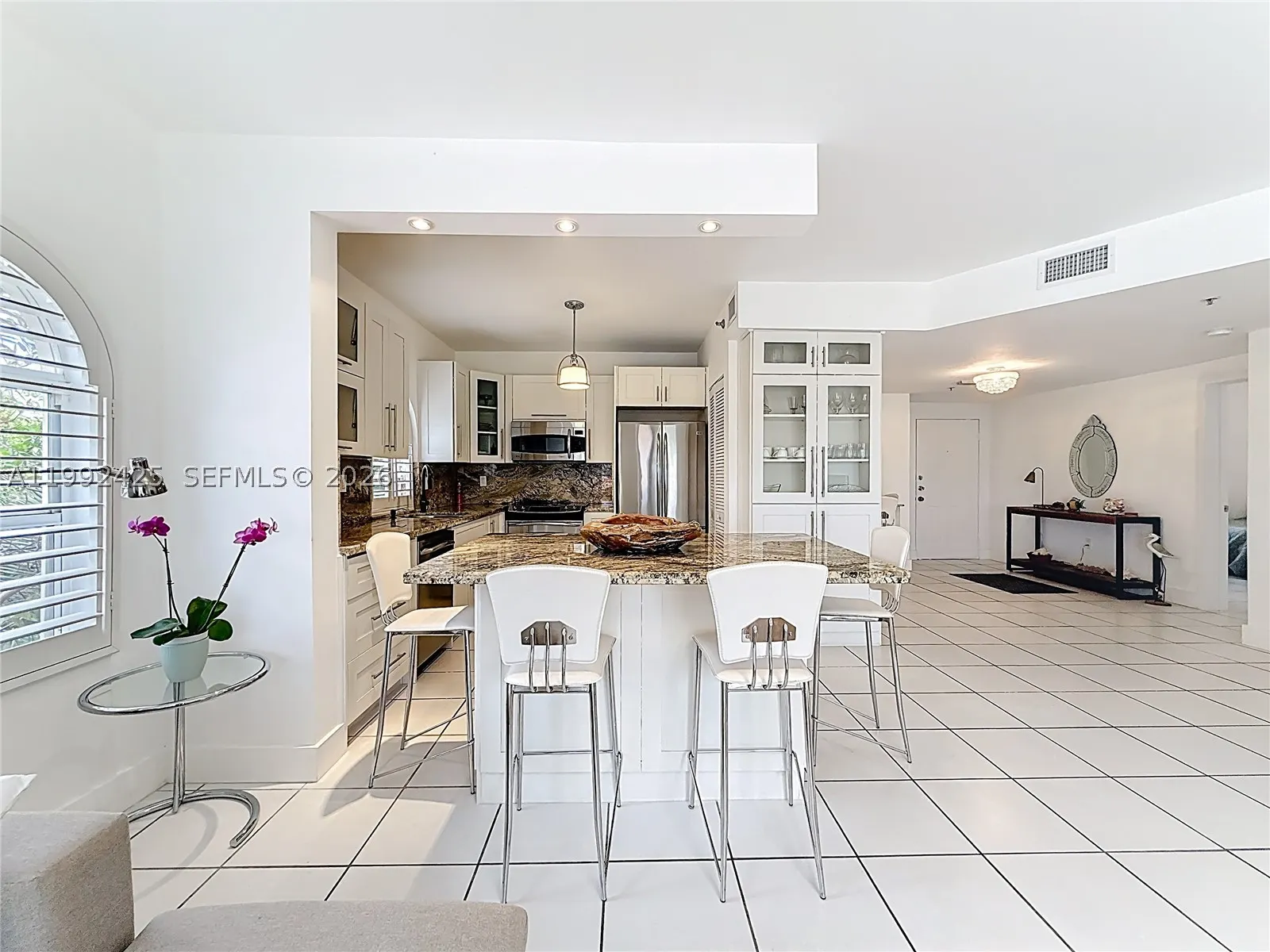 9008 Collins Ave #303