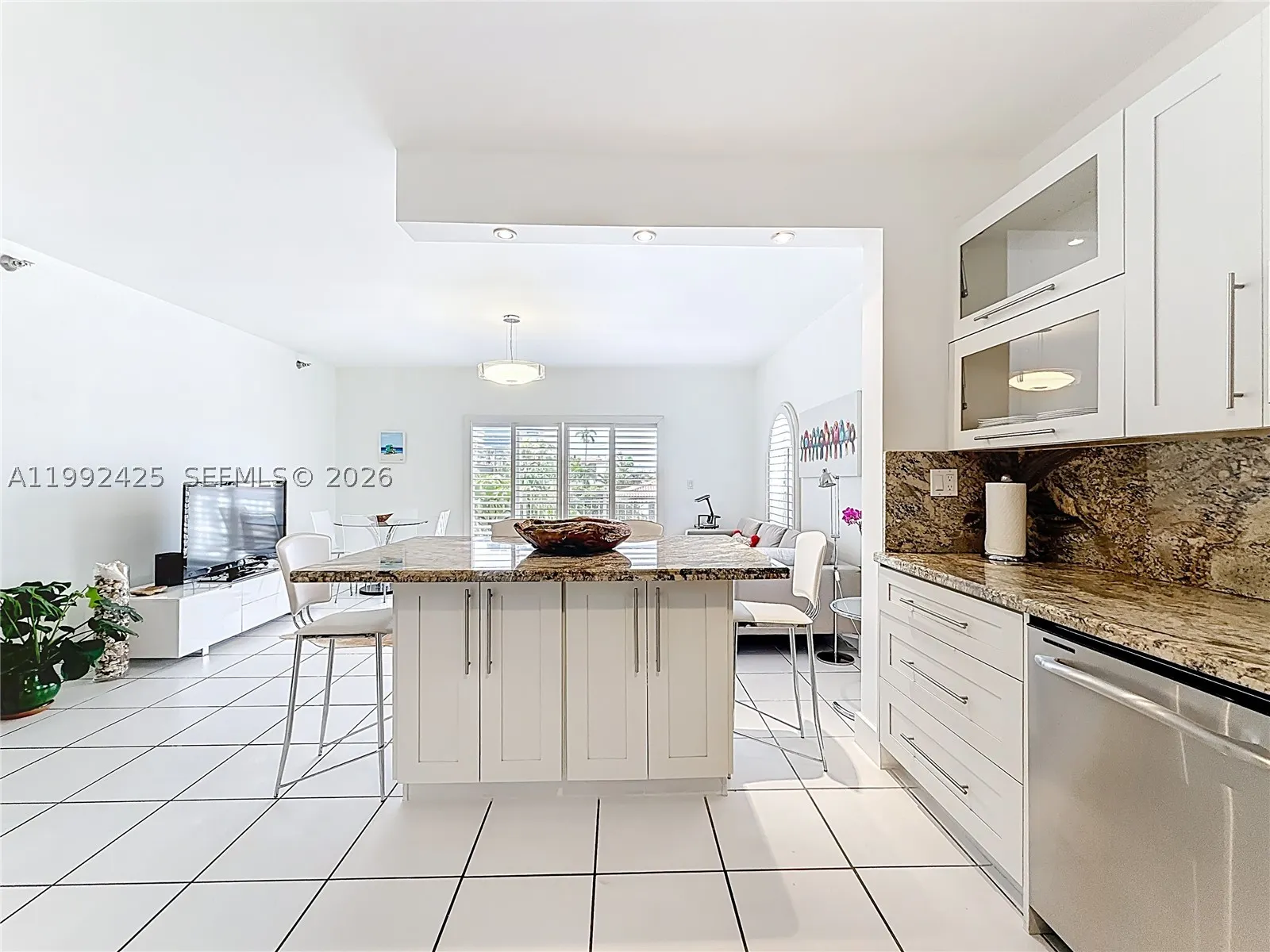 9008 Collins Ave #303