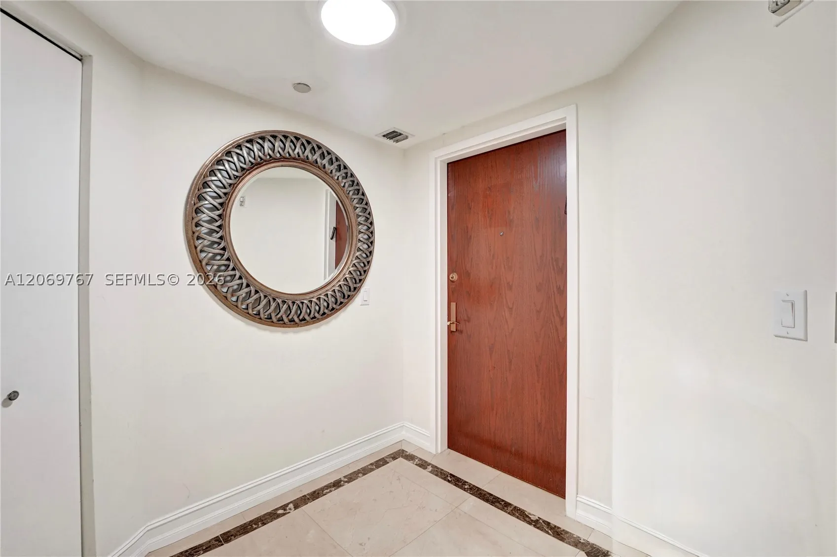 9595 N Collins Ave. #5NG