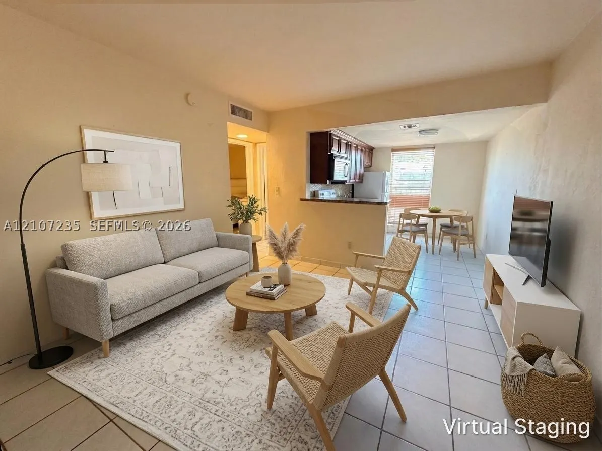 241 S Royal Poinciana Blvd #205