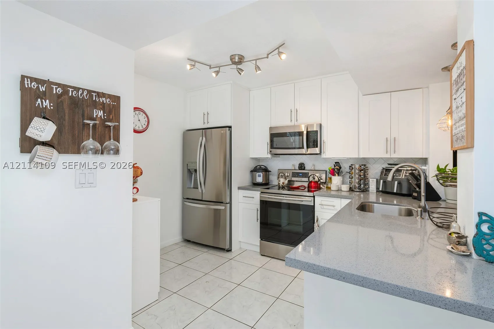 15761 SW 137th Ave #104