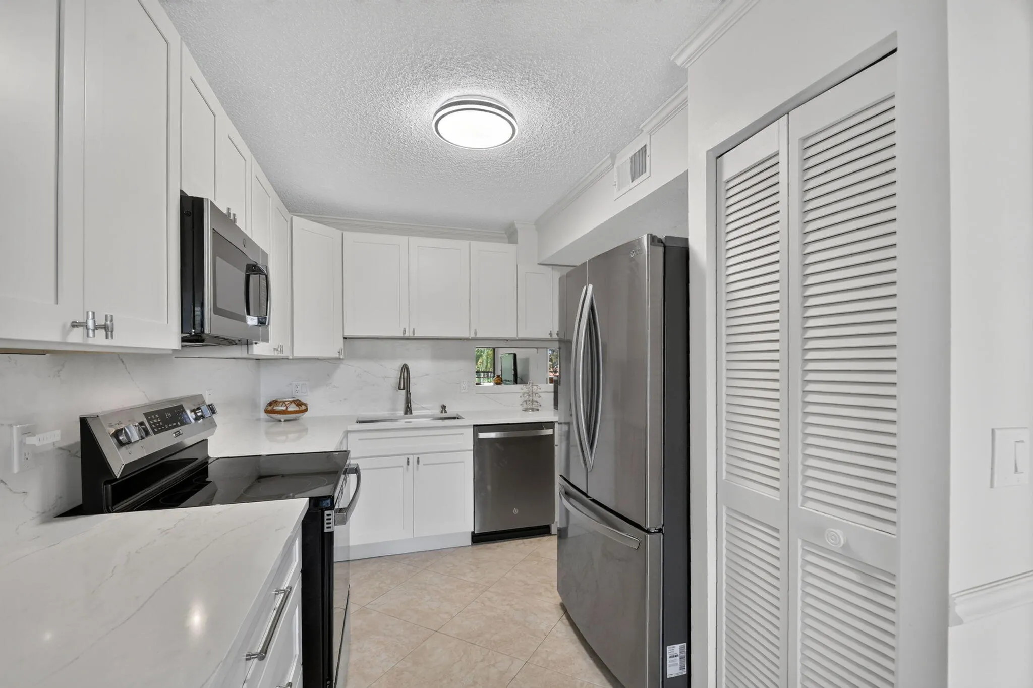 10156 MANGROVE Drive #303