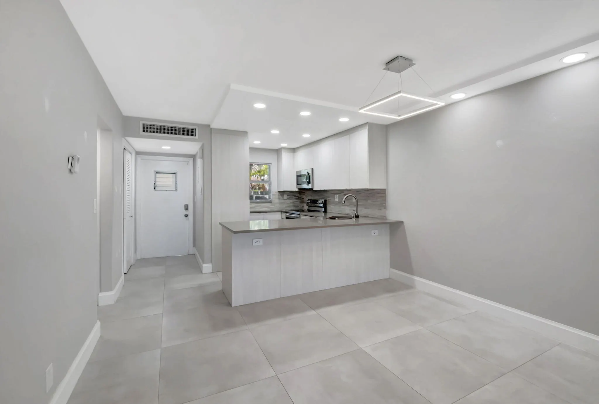 750 NE Spanish River Boulevard #103