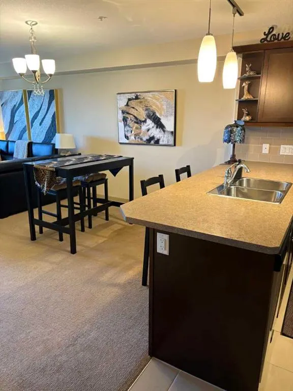 310 McKenzie Towne Gate SE, #1306