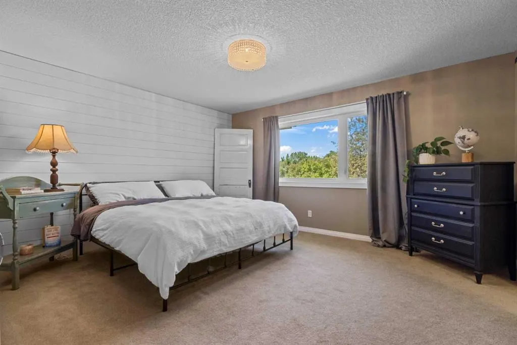 80057 Highwood Meadows Drive E