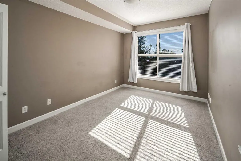 88 Arbour Lake Road NW, #203
