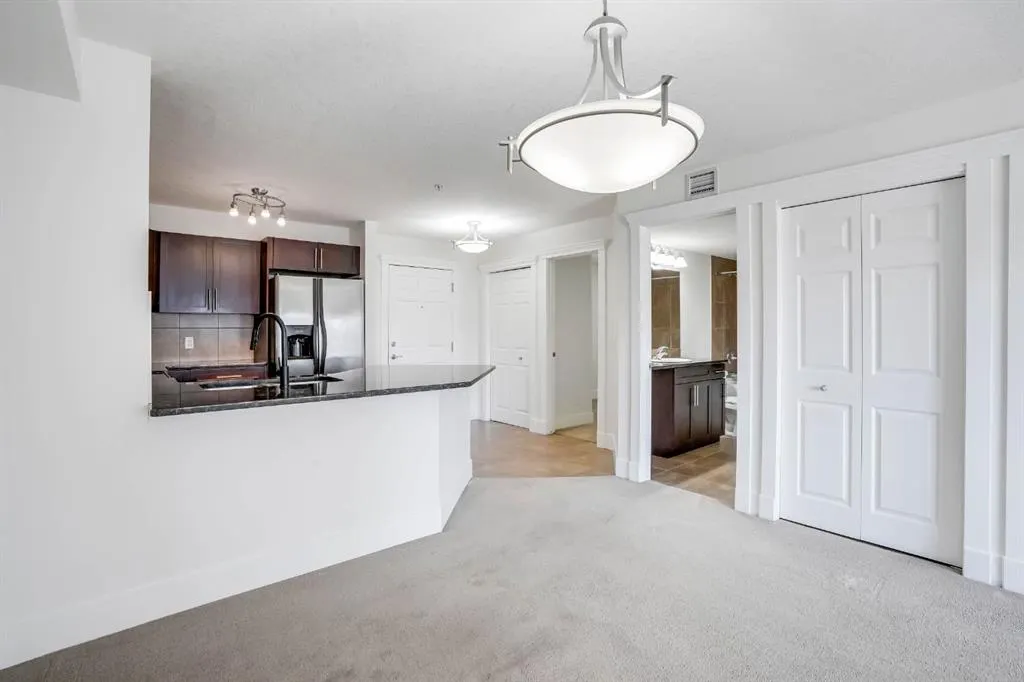 500 Rocky Vista Gardens NW, #103