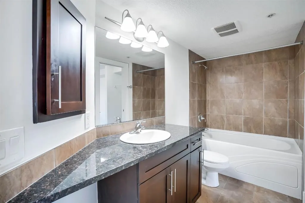 500 Rocky Vista Gardens NW, #103