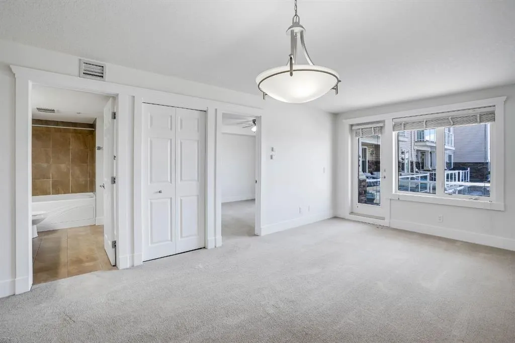 500 Rocky Vista Gardens NW, #103