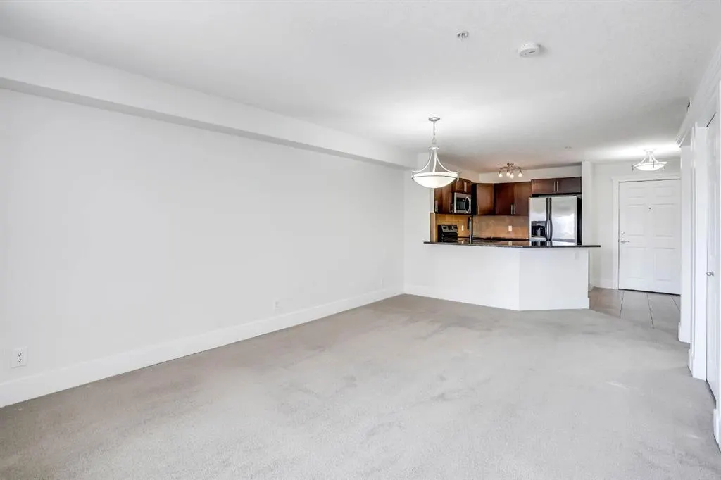 500 Rocky Vista Gardens NW, #103
