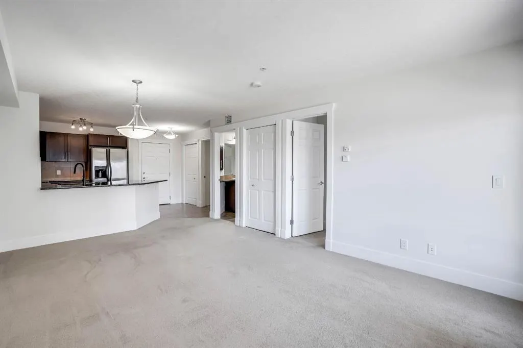 500 Rocky Vista Gardens NW, #103