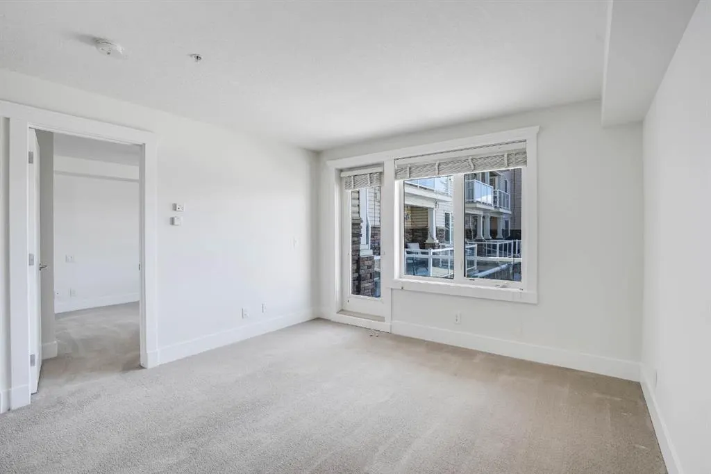 500 Rocky Vista Gardens NW, #103