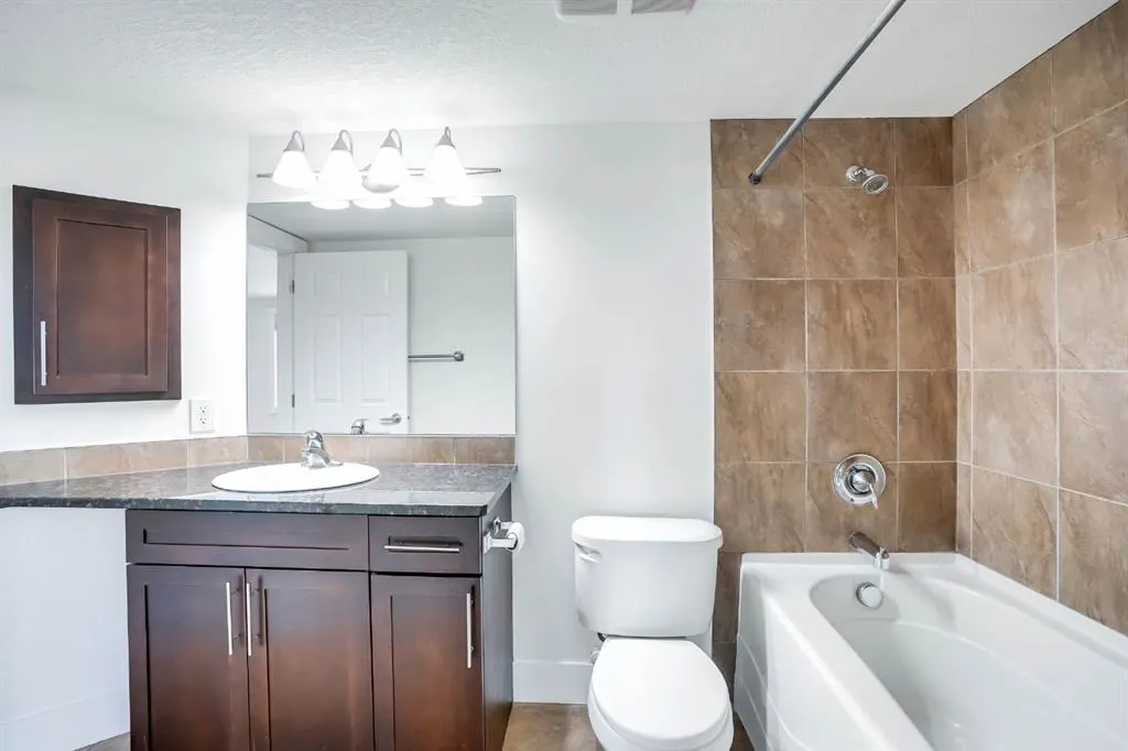 500 Rocky Vista Gardens NW, #103