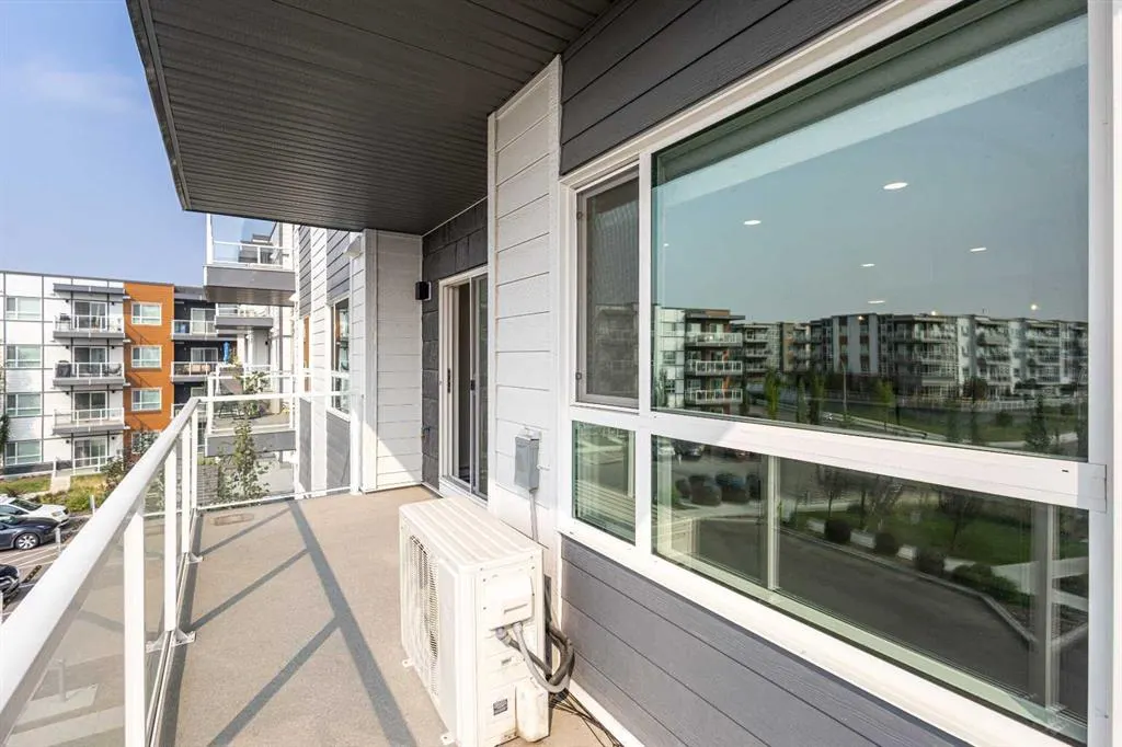 360 HEARVEST HILLS Way NE, #306