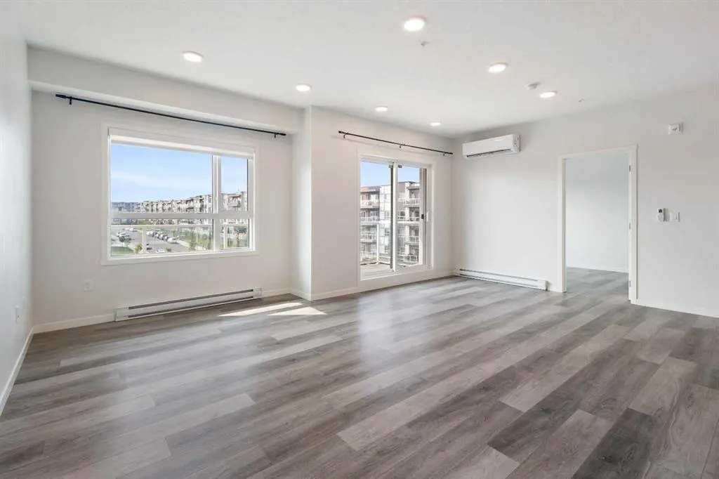 360 HEARVEST HILLS Way NE, #306