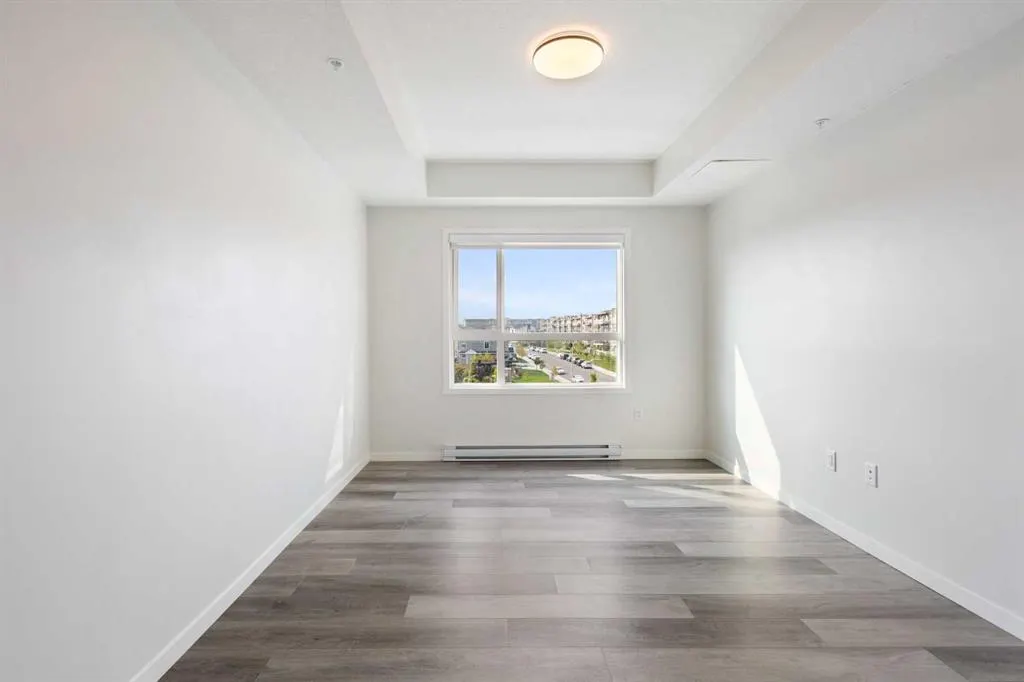 360 HEARVEST HILLS Way NE, #306