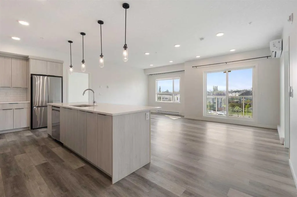 360 HEARVEST HILLS Way NE, #306
