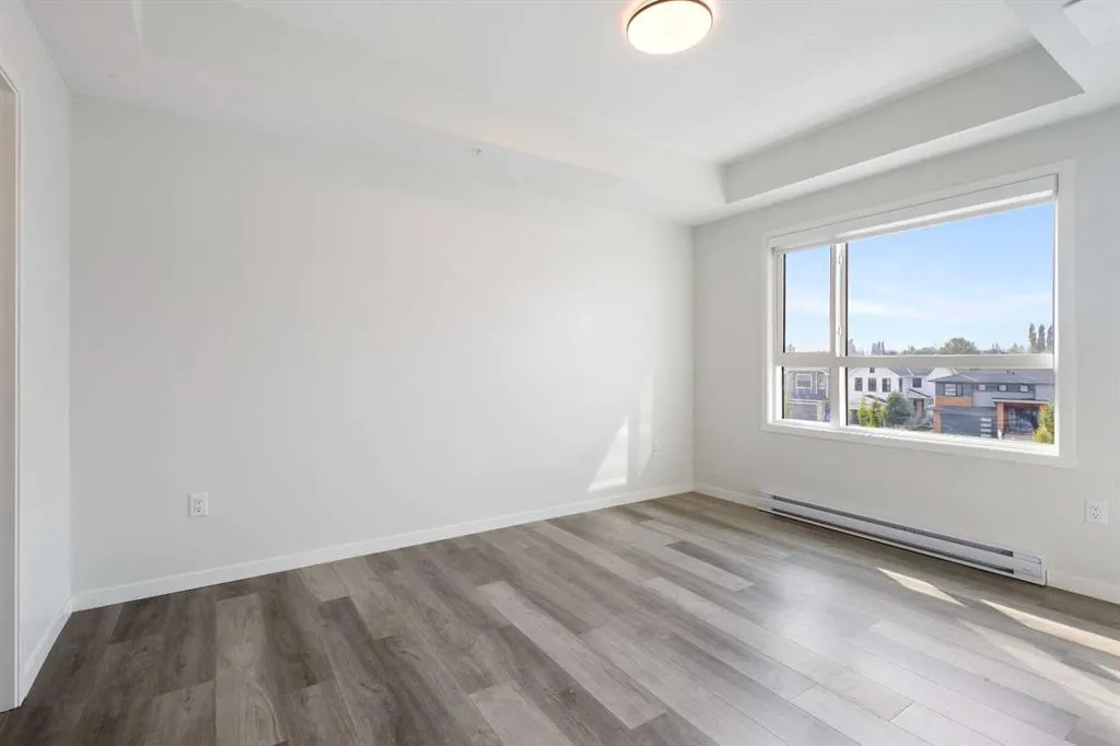 360 HEARVEST HILLS Way NE, #306