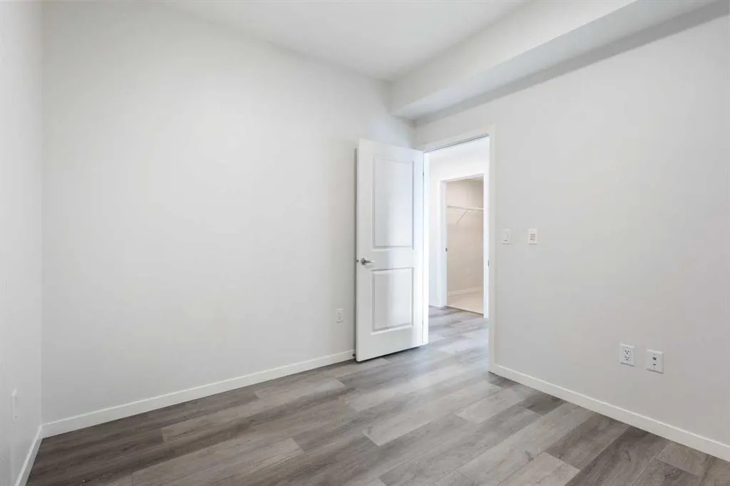 360 HEARVEST HILLS Way NE, #306